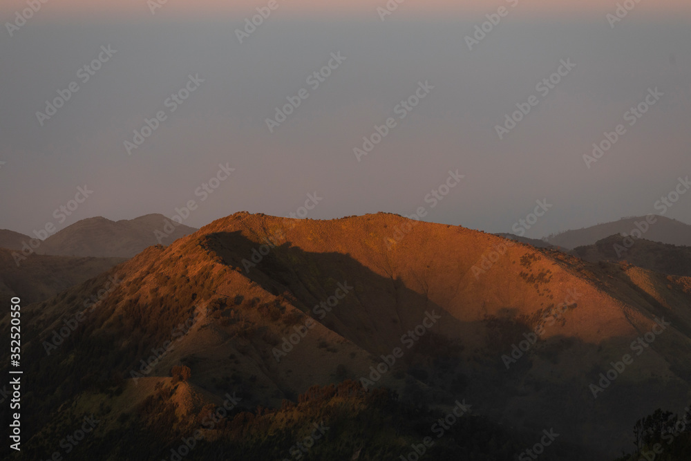 Landscapes and sunrise details at the Widodaren mountain, and the Tengger massif, in East Java, Indonesia.