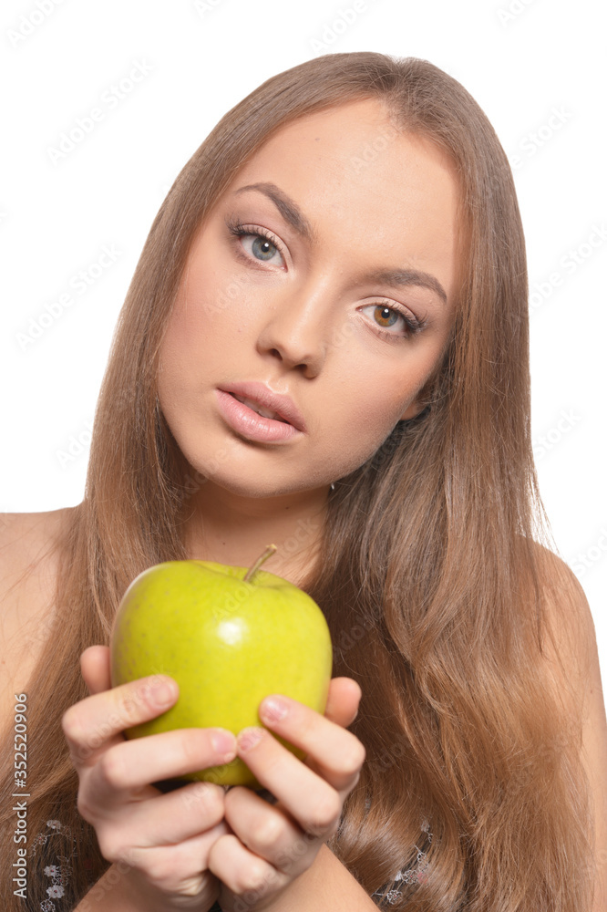 Close up portrait of beautiful young woman with green apple Close up portrait of beautiful young woman with green apple