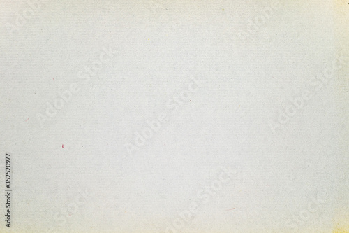 sheet of grey paper with a textured surface