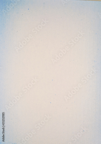 sheet of grey paper with a textured surface