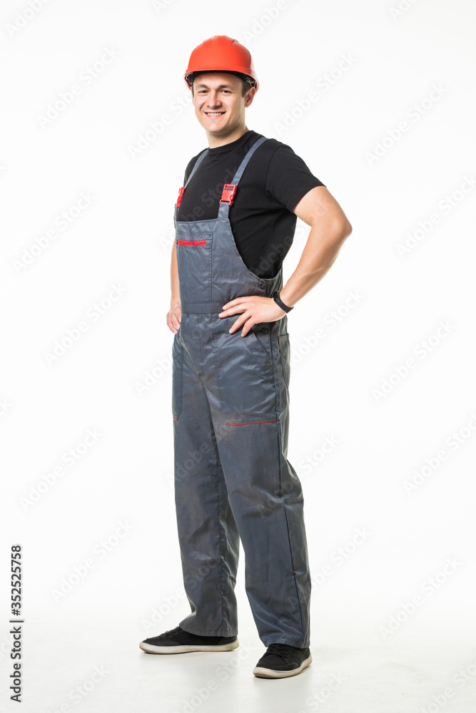Portrait of smiling manual worker with tools isolated on white background Portrait of smiling manual worker with tools isolated on white background