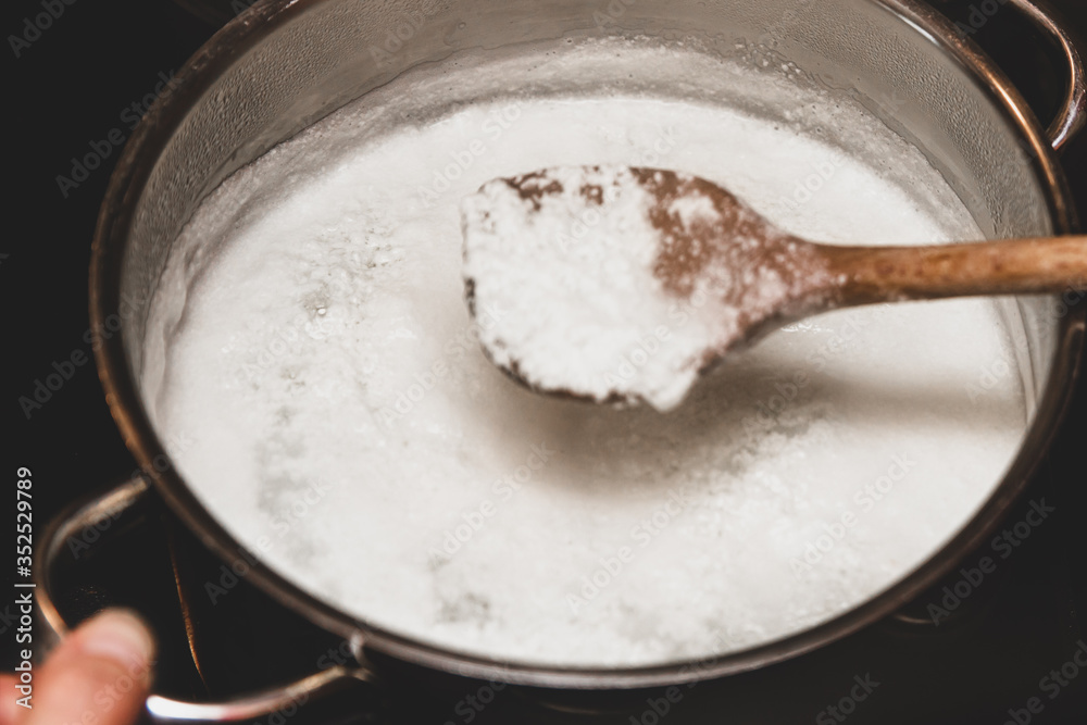 Fresh cheese making process, clotted cheese in a saucepan Fresh cheese making process, clotted cheese in a saucepan