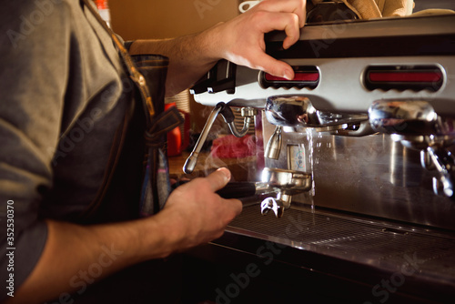 close up barista hand making a cup of coffee