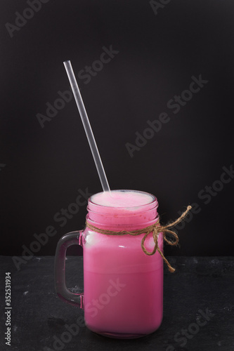 whey protein shake with raspberry flavor