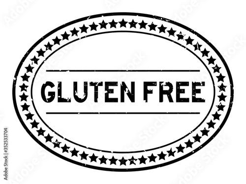 Grunge black gluten free word oval rubber seal stamp on white background