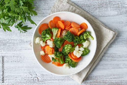 Behang Mix of boiled vegetables