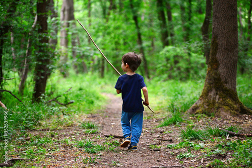Kid in the forest