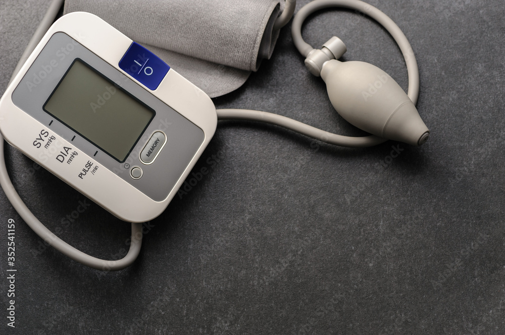 tonometer-device for measuring pressure in the office on a dark table tonometer-device for measuring pressure in the office on a dark table