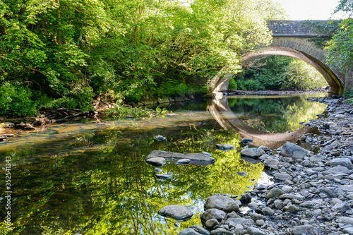 Fototapeta Bridge over the Amman River at Glanamman, Carmarthenshire, Wales.