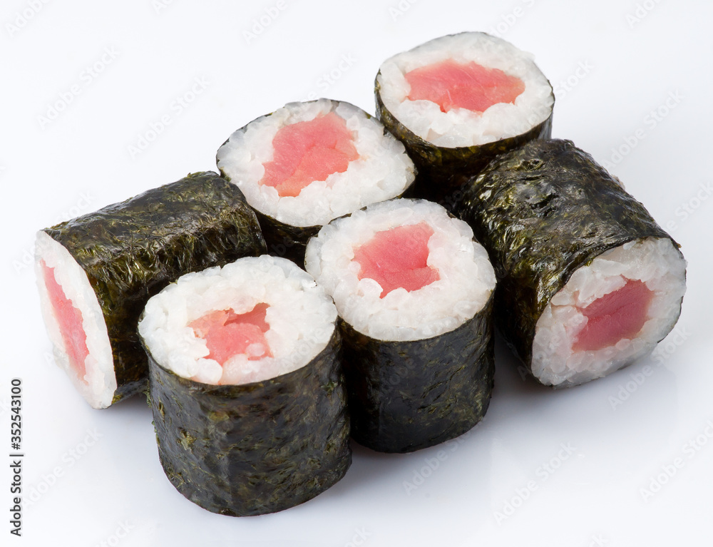 Tasty fresh sushi rolls isolated on white background. Japanese cousine, asian food. Seafood, fish, rice Tasty fresh sushi rolls isolated on white background. Japanese cousine, asian food. Seafood, fish, rice