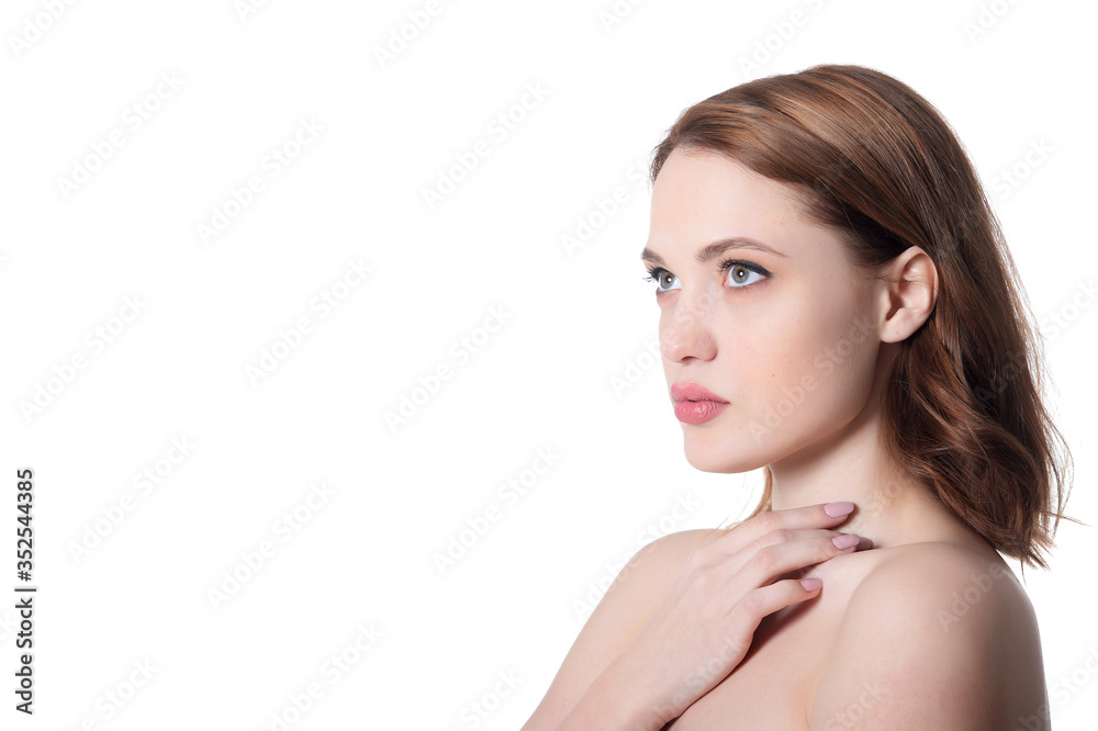 Beautiful young woman posing isolated on white background Beautiful young woman posing isolated on white background