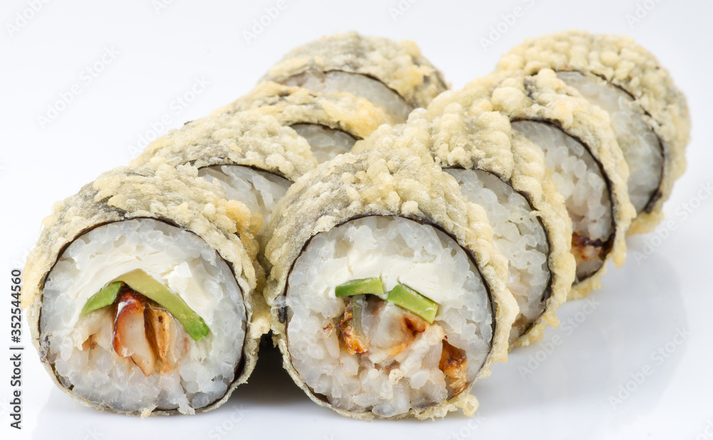 Tasty fresh sushi rolls isolated on white background. Japanese cousine, asian food. Seafood, fish, rice Tasty fresh sushi rolls isolated on white background. Japanese cousine, asian food. Seafood, fish, rice