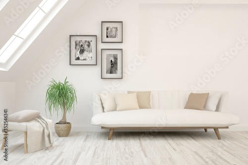 White living room with sofa and pictures on a wall. Scandinavian interior design. 3D illustration © AntonSh
