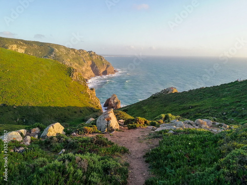 Cabo da Roca or Cape Roca is a cape which forms the westernmost point of the Sintra Mountain Range, of mainland Portugal, of continental Europe, and of the Eurasian land mass
Cabo da Roca, the western