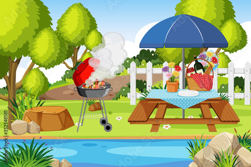 Scene with BBQ and food on the picnic table in the park