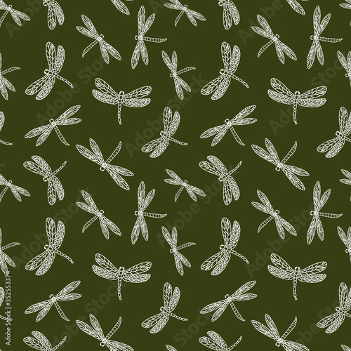 Seamless green pattern with hand drawn dragonflies