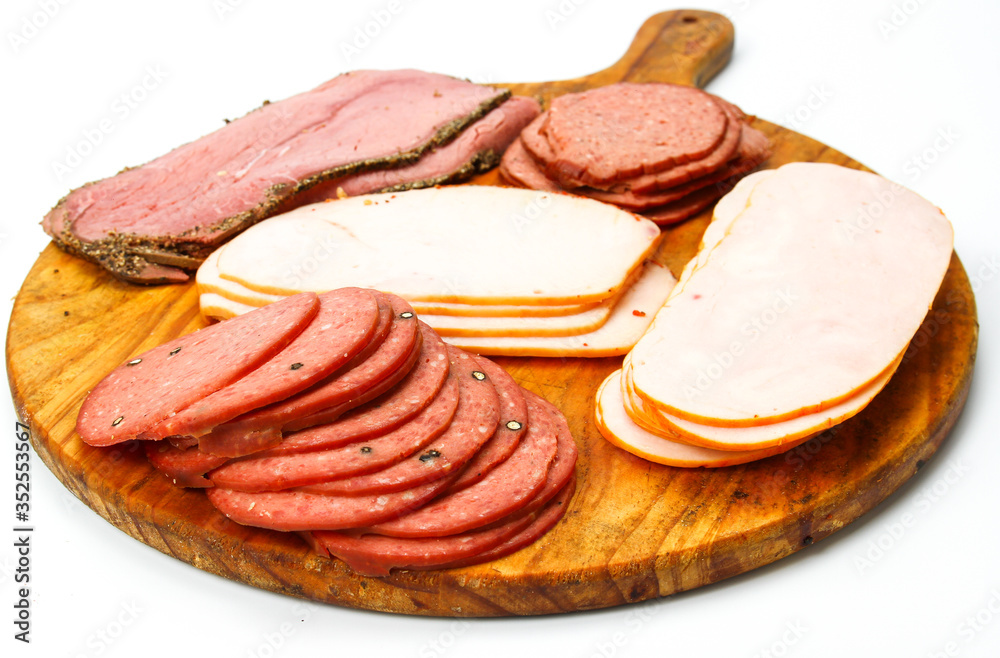 Slices of different sausage
