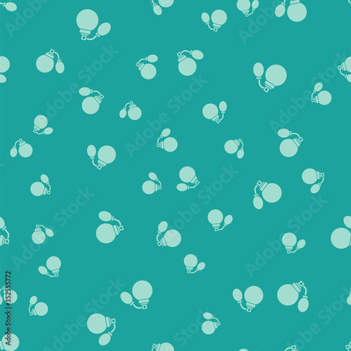 Green Aftershave bottle with atomizer icon isolated seamless pattern on green background. Cologne spray icon. Male perfume bottle. Vector Illustration.