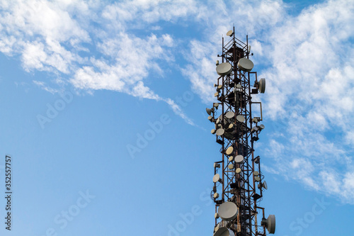 Mobile phone Telecommunication Radio antenna Tower with blue sky. Cell tower.