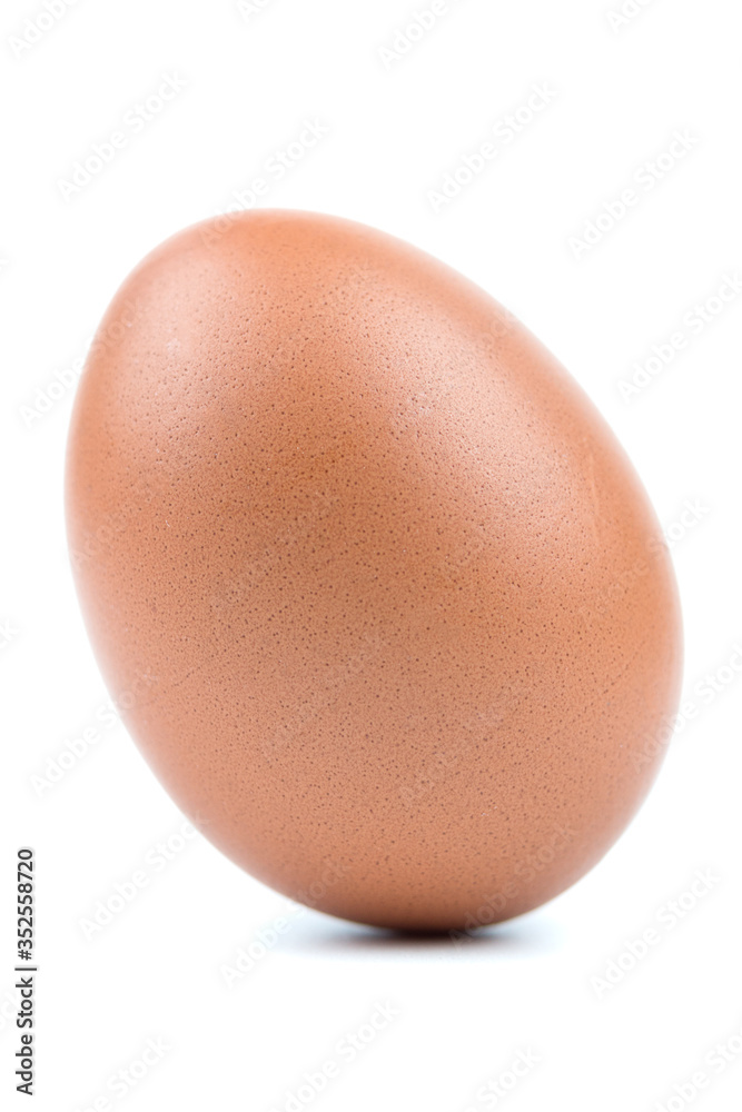 Single brown eggs isolated from white background. Single brown eggs isolated from white background.