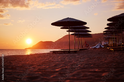 Beautiful landscape. Traveling by Turkey. Sea Beach with sunloungers and umbrellas. © luengo_ua