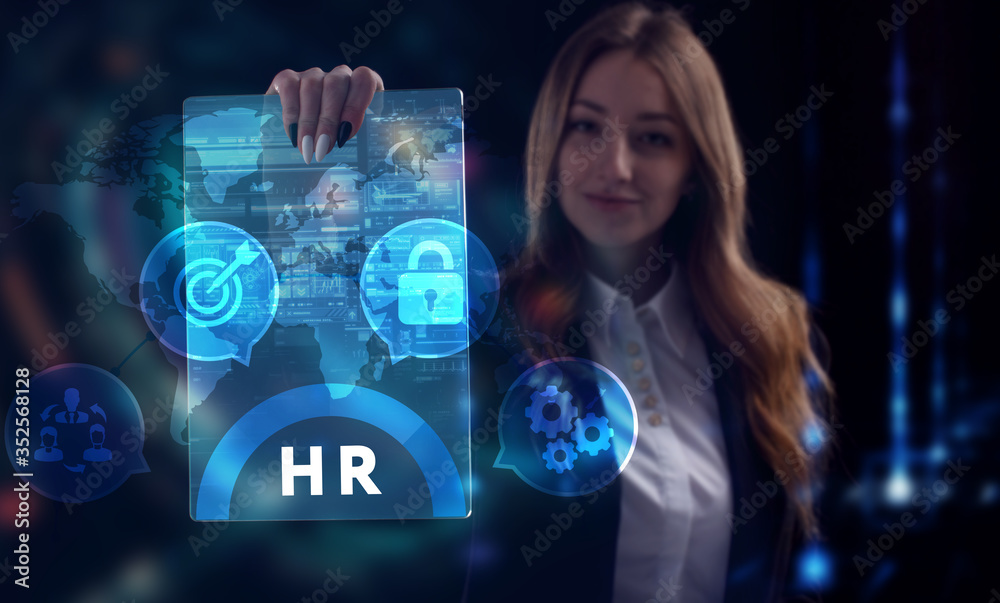 Business, Technology, Internet and network concept. Young businessman working on a virtual screen of the future and sees the inscription: HR Business, Technology, Internet and network concept. Young businessman working on a virtual screen of the future and sees the inscription: HR