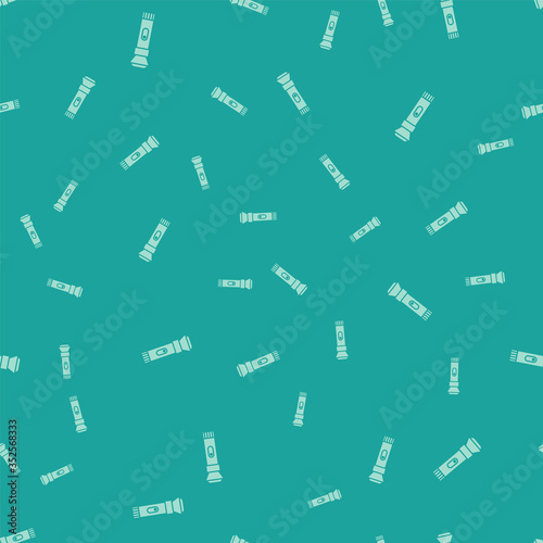 Green Flashlight icon isolated seamless pattern on green background. Vector Illustration.