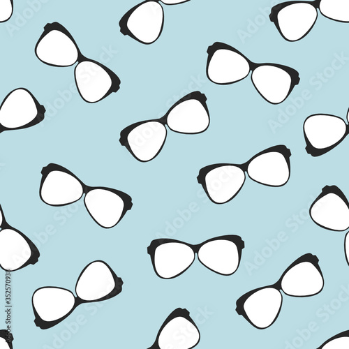 Glasses seamless pattern on blue background.