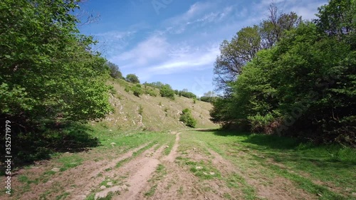 View of Cheddar Gorge in Somerset, England - a limestone gorge in the Mendip Hills, Cheddar, Somerset United Kingdom - 25th of May 2020 photo