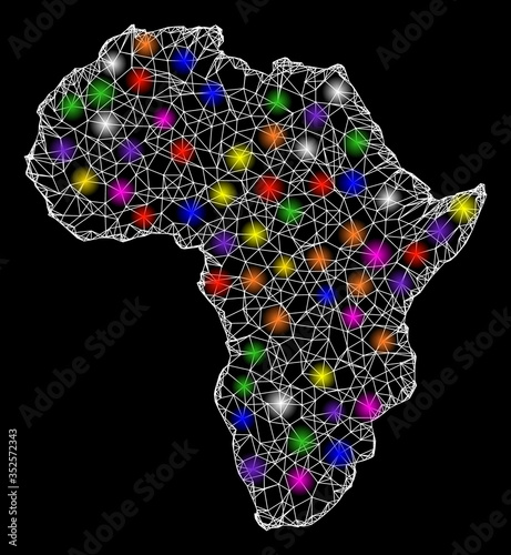 Web mesh vector map of Africa with glare effect on a black background. Abstract lines, light spots and circle dots form map of Africa constellation.