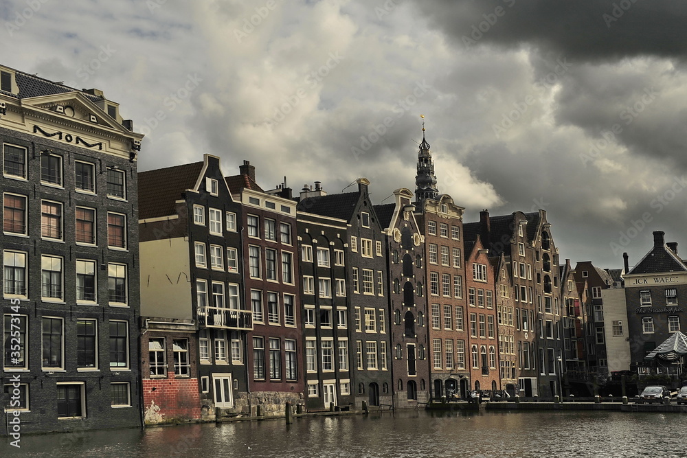 Amsterdam, Netherlands - June, 28, 2013: Bank of the canal in the historical part of the city