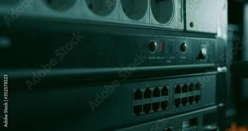 Datacenter technician presses the 