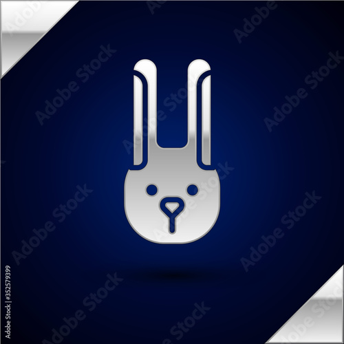 Silver Rabbit with ears icon isolated on dark blue background. Magic trick. Mystery entertainment concept. Vector Illustration.