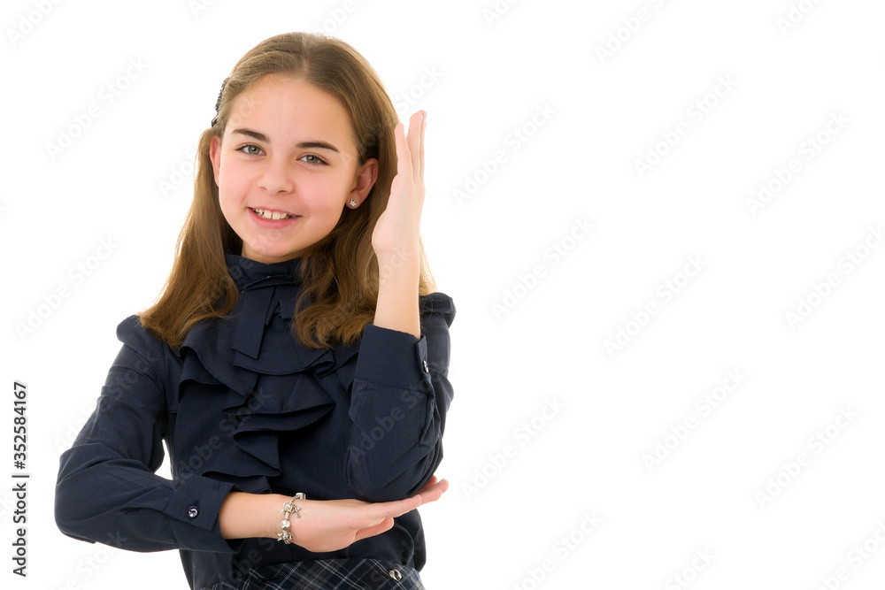 Girl schoolgirl raises her hand up. Girl schoolgirl raises her hand up.