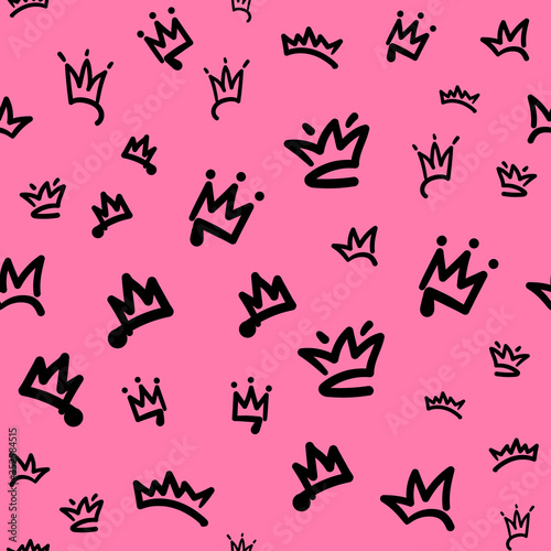 Seamless pattern with a variety of crowns. Doodle, sketch. Cute vector illustration.