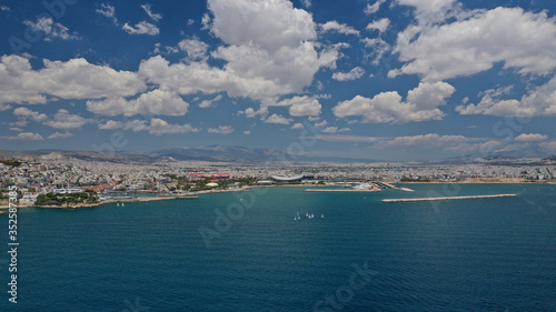 Aerial drone photo of famous round port of Mikrolimano in urban seascape of Piraeus, Attica, Greece