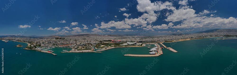 Aerial drone photo of famous round port of Mikrolimano in urban seascape of Piraeus, Attica, Greece