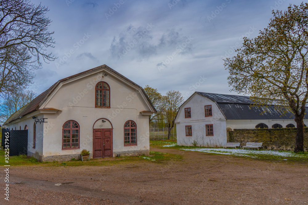 Houses in Gysinge. Swedish countryside. Scandinavian landscape. Snow in May. Sweden Houses in Gysinge. Swedish countryside. Scandinavian landscape. Snow in May. Sweden