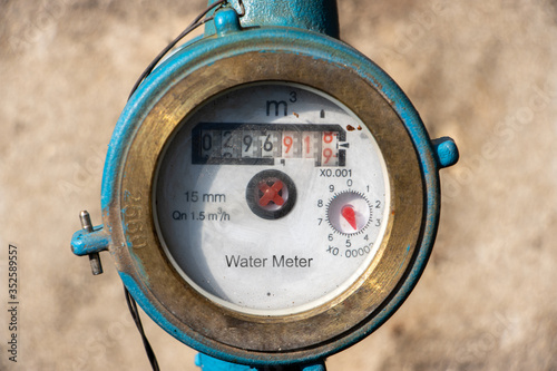 Water meter with water consumption status. Water meter shows household consumption of water..
