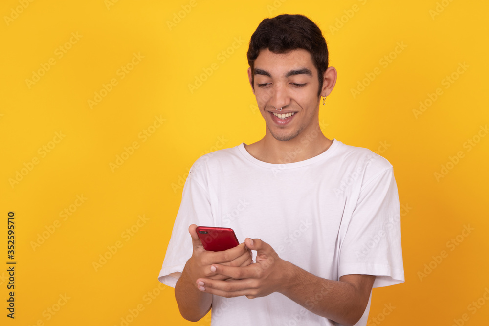 young male teenager isolated on color background young male teenager isolated on color background