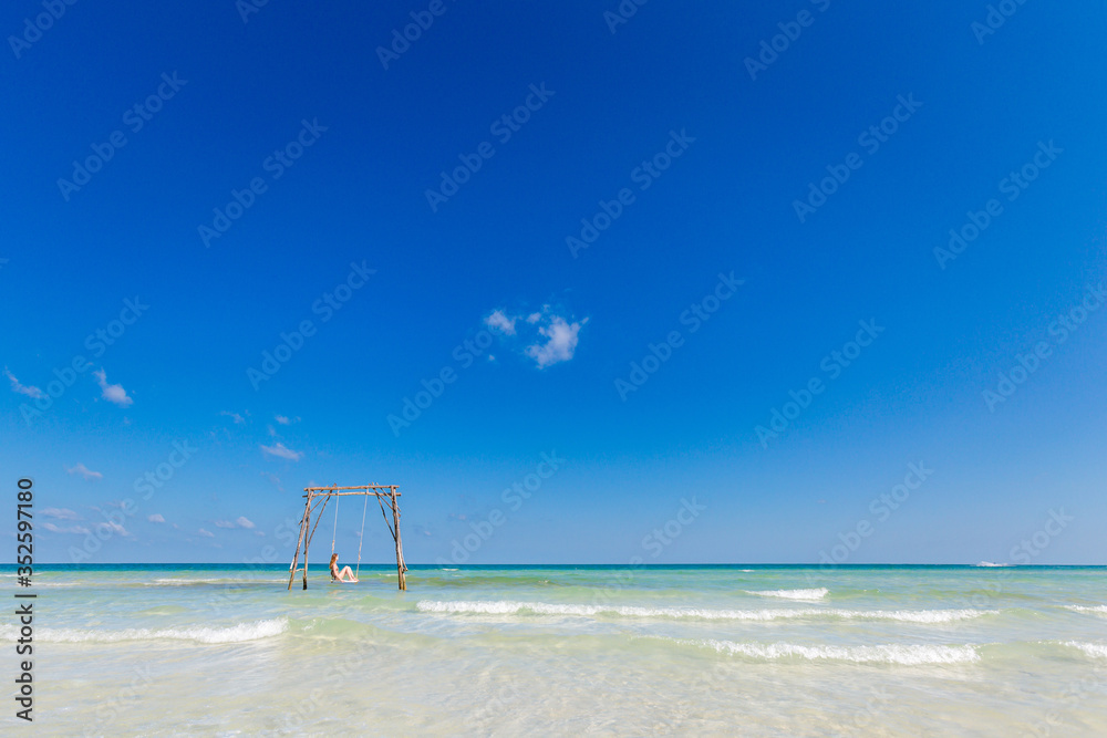 Young woman on swing Phu Quoc Young woman on swing Phu Quoc