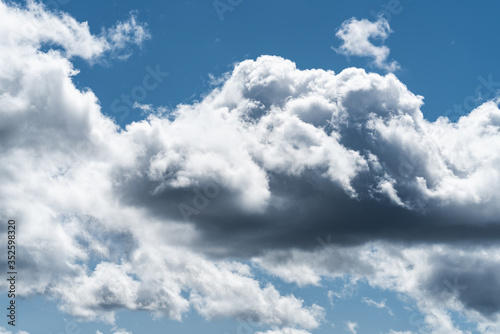 Cumulus clouds in a blue sky © Visual Motiv