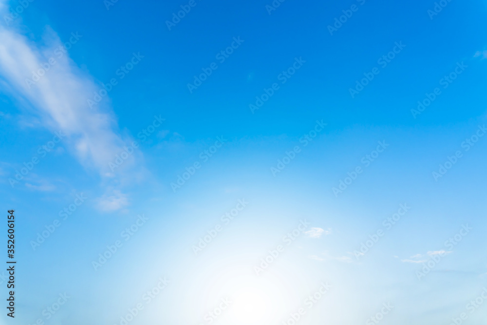 Obraz premium Blue sky with white cloud. Beautiful sky background and wallpaper. Clear day and good weather in the evening. bright,Thailand-Malaysia border.
