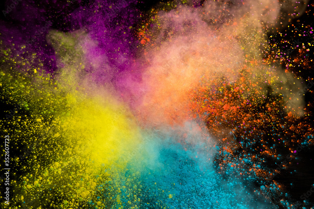 Launched colorful powder on black background, freeze motion Launched colorful powder on black background, freeze motion