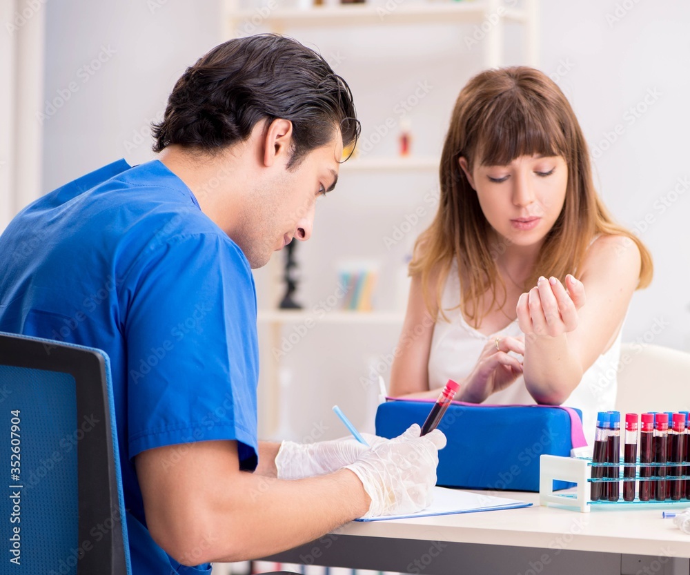 Young patient during blood test sampling procedure Young patient during blood test sampling procedure