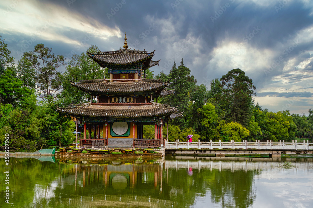 Temple in the Chinese gardens of the Black Dragon Pool in Jade Spring Park
