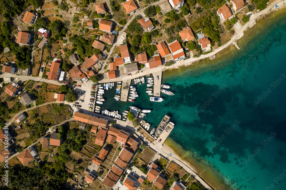 Marina with small boats and yachts - Top down aerial view