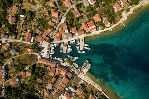Marina with small boats and yachts - Top down aerial view