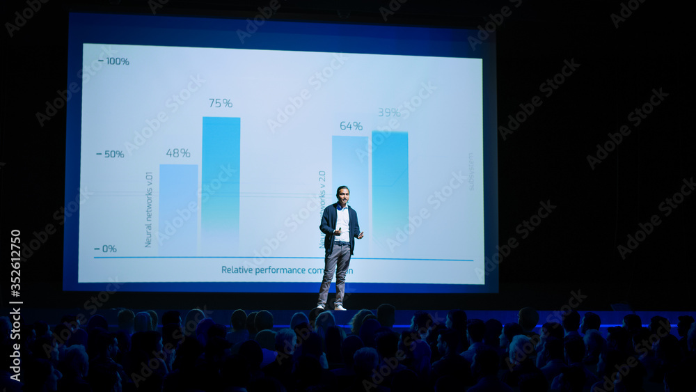 Startup Conference Stage: Speaker Presents New Product, Talks about Performance, Neural Networks, Artificial Intelligence, Big Data and Machine Learning. Live Event with Large Audience - obrazy, fototapety, plakaty 