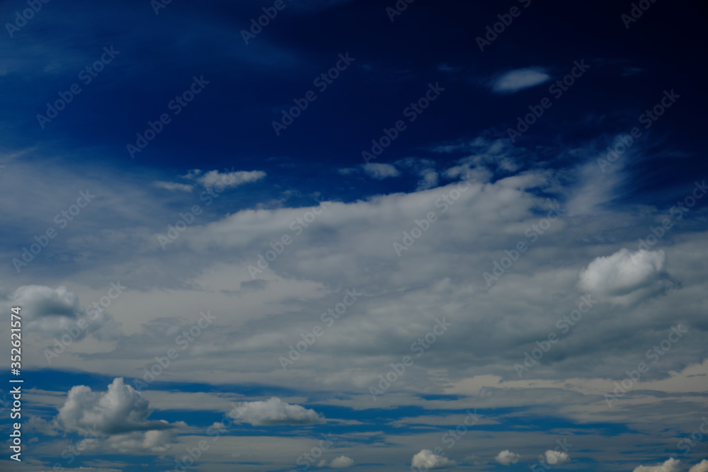 blue sky with clouds at noon blue sky with clouds at noon